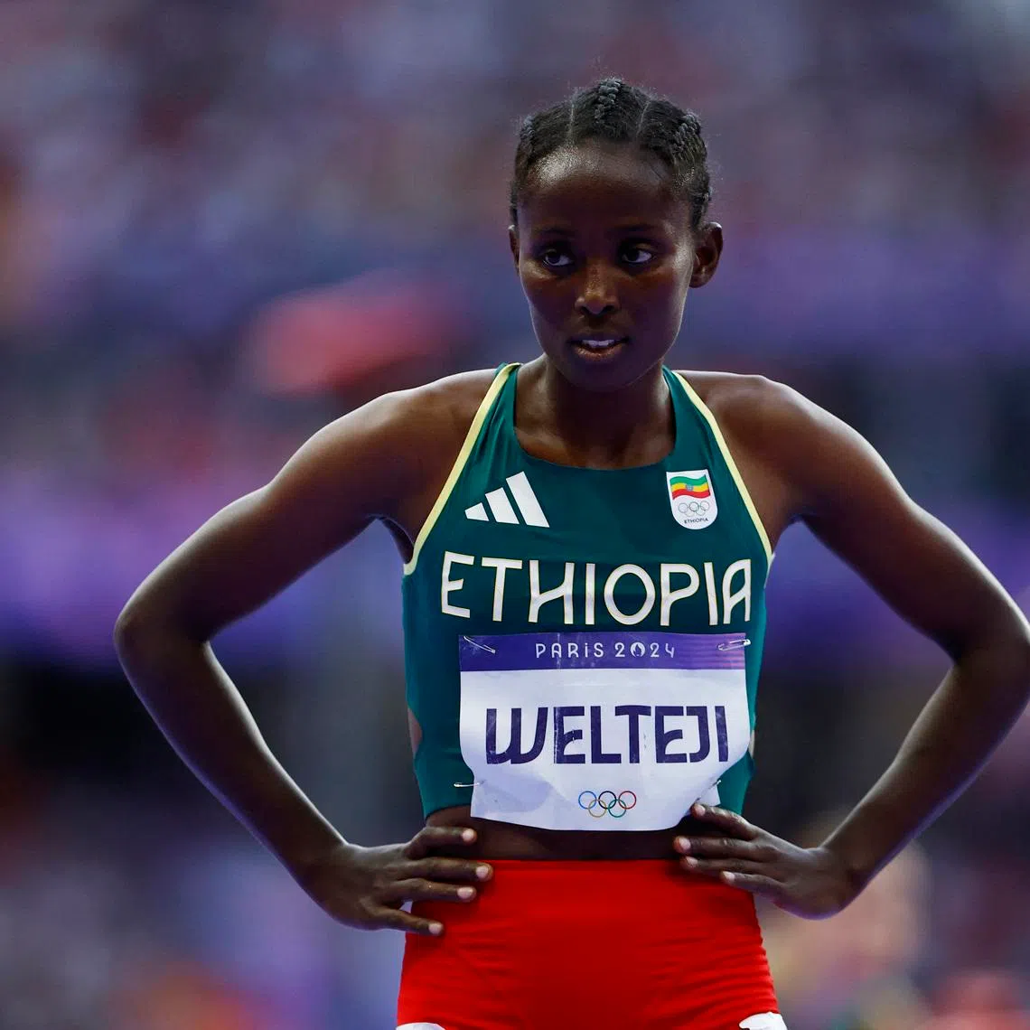 Paris 2024 Olympics - Athletics - Women's 1500m Semi-Final 2 - Stade de France, Saint-Denis, France - August 08, 2024. Diribe Welteji of Ethiopia reacts after winning her semi final. REUTERS/Sarah Meyssonnier