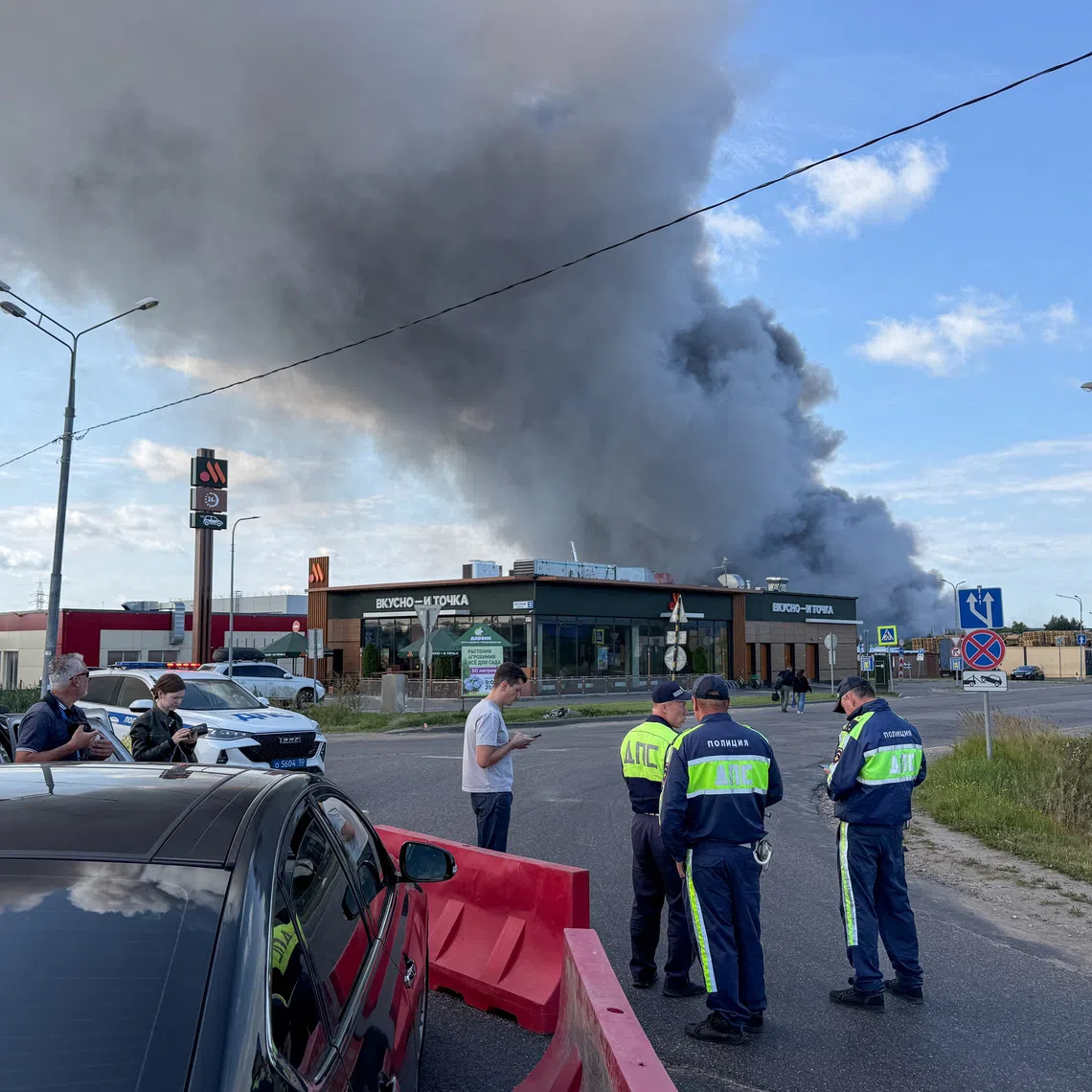 Smoke billows from the burning Wildberries warehouses following a Ukrainian drone attack, according to the regional governor, in the course of the Russia-Ukraine conflict, in Koledino, Moscow Region, Russia August 16, 2026. Picture taken with mobile phone. REUTERS/Stringer
