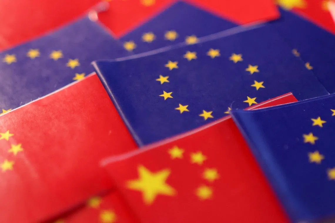 EU and Chinese flags are seen in this illustration taken, March 20, 2025. REUTERS/Dado Ruvic/Illustration