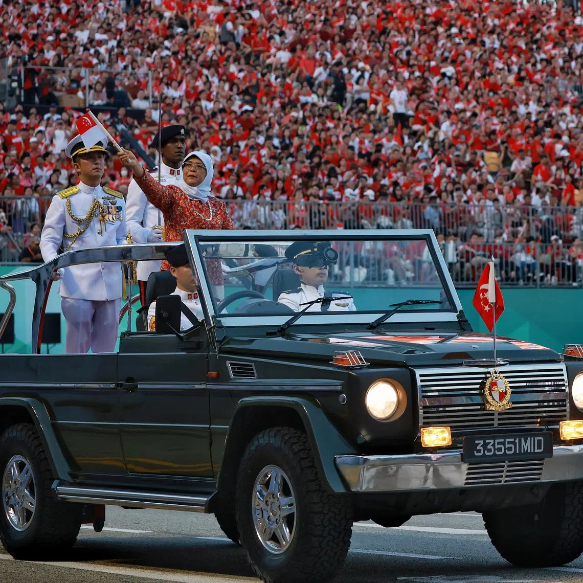 President Halimah Yacob arrived at the Padang at about 6.50pm, to applause and cheers from the gathered spectators.