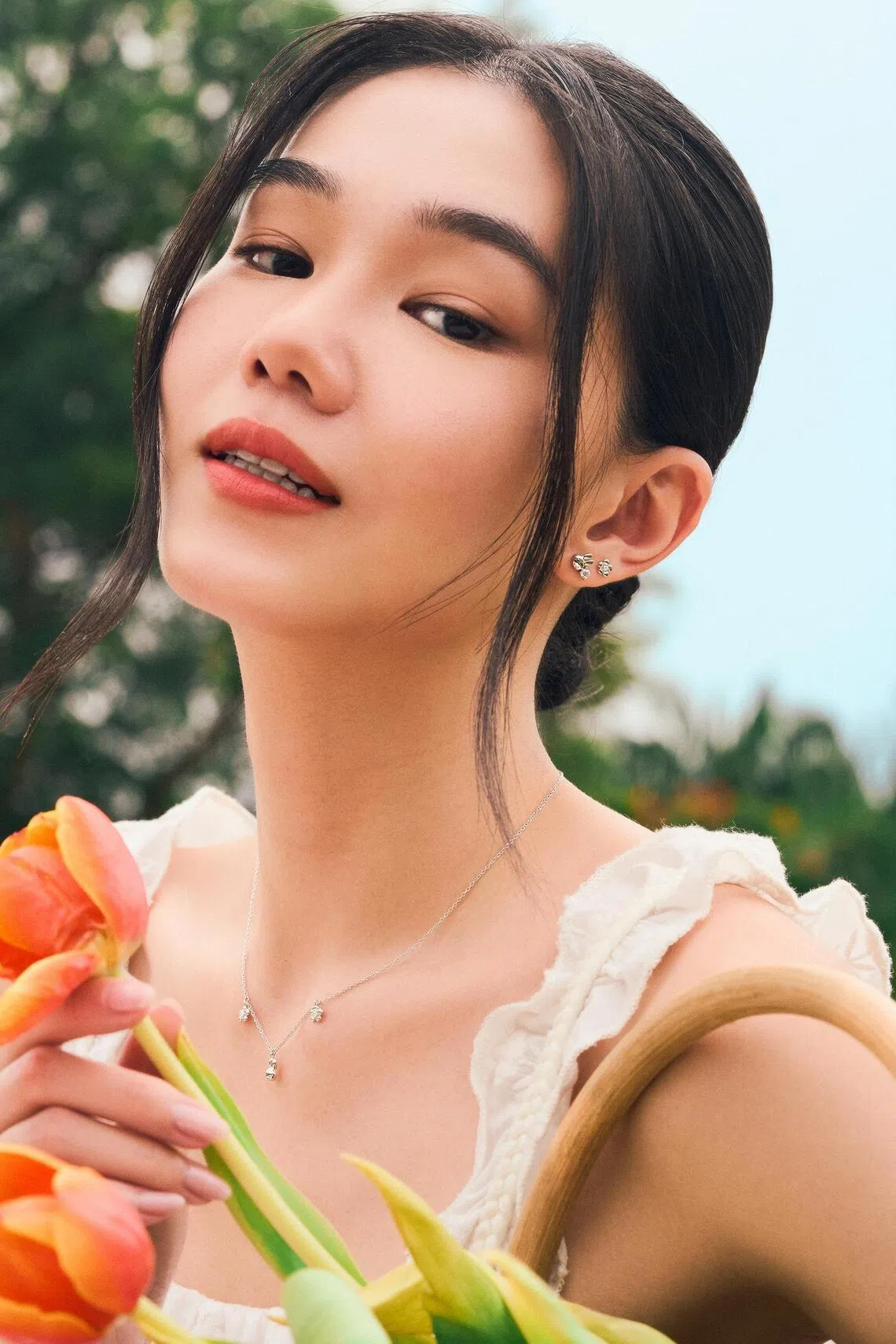 The Miffy Posy Necklace and Petal Studs in silver, part of the Blooming With Miffy collection.