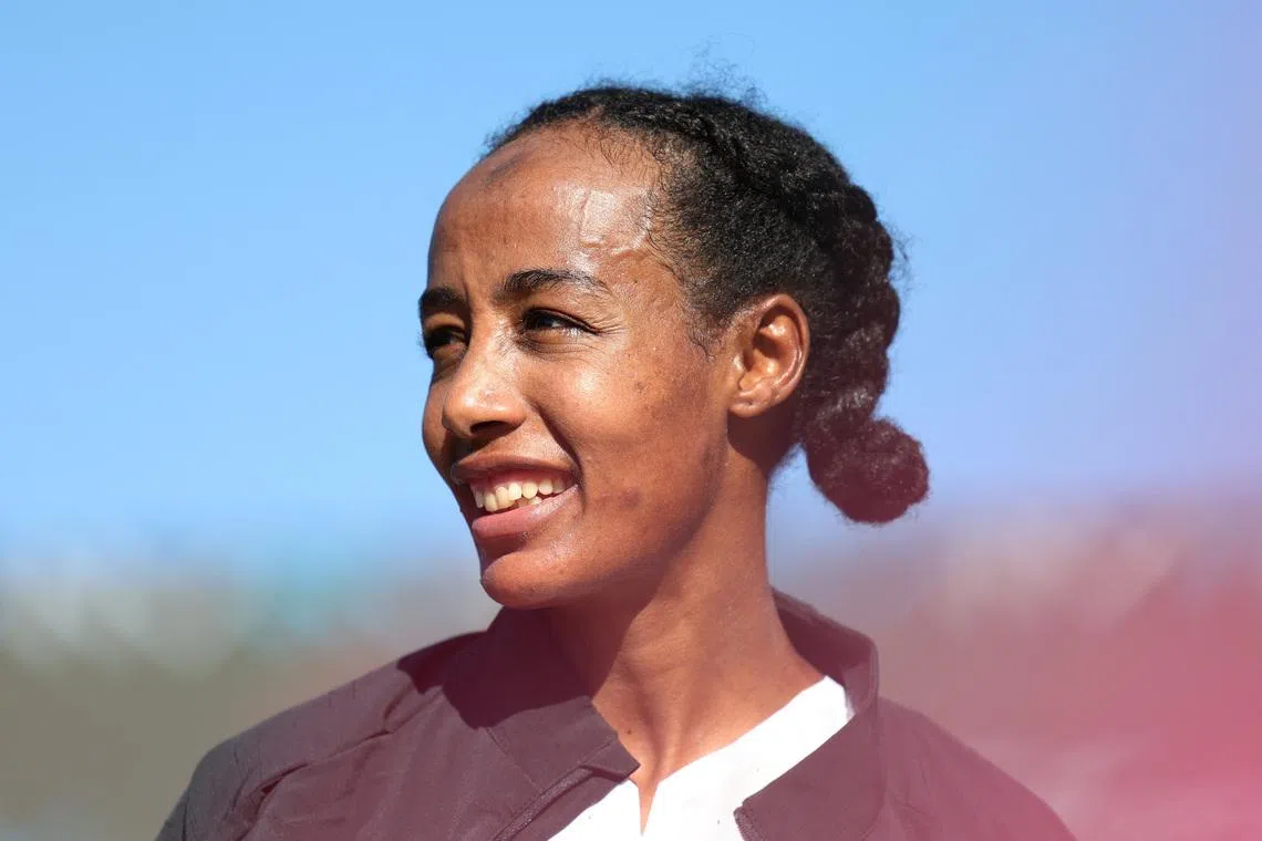 Athletics - Sydney Marathon - Sydney, Australia - August 31, 2025 Netherlands' Sifan Hassan celebrates after winning the Sydney Marathon. REUTERS/Hollie Adams