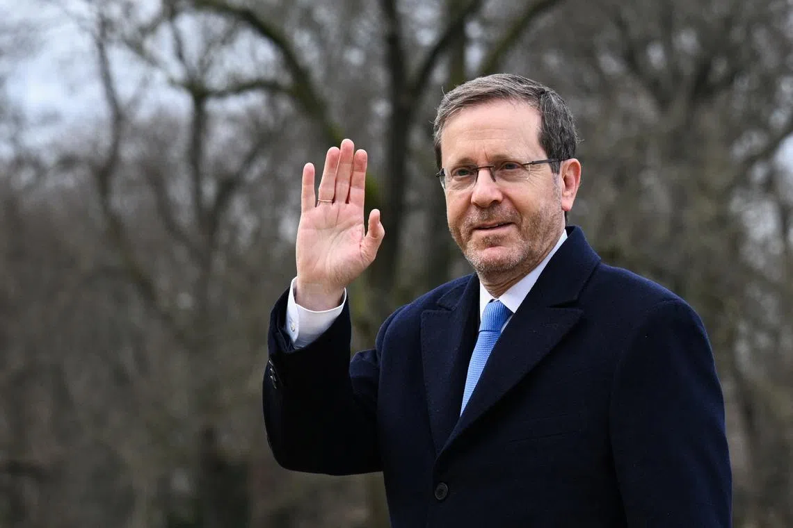 FILE PHOTO: Israeli President Isaac Herzog waves, on the day he meets German President Frank Walter-Steinmeier, at Bellevue Palace in Berlin, Germany, February 16, 2024. REUTERS/Annegret Hilse/File Photo