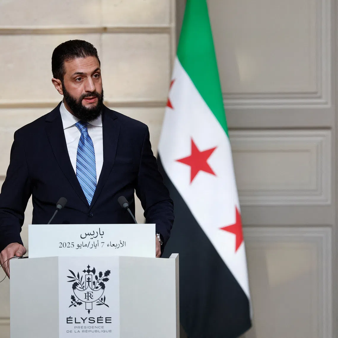 Syrian President Ahmed al-Sharaa speaks during a joint press conference with French President Emmanuel Macron after a meeting at the Elysee Palace in Paris, France, May 7, 2025. REUTERS/Stephanie Lecocq/Pool