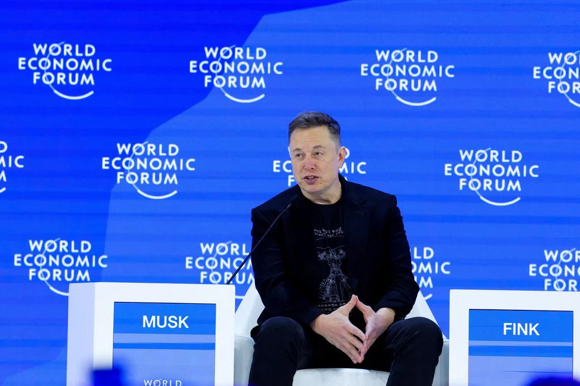 Elon Musk attends the 56th annual World Economic Forum (WEF) meeting in Davos, Switzerland, January 22, 2026. REUTERS/Denis Balibouse
