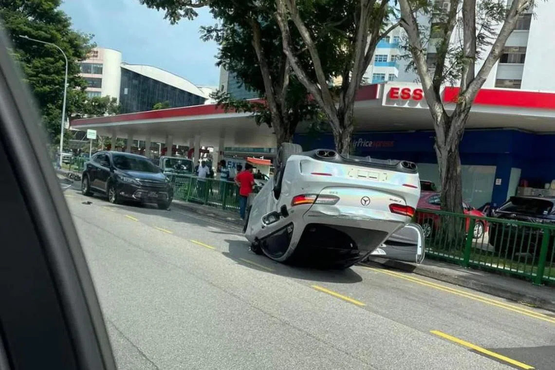 A Mercedes E300 AMG speeding at lane one on McPherson Road crashes and overturns on Feb 18 afternoon.
