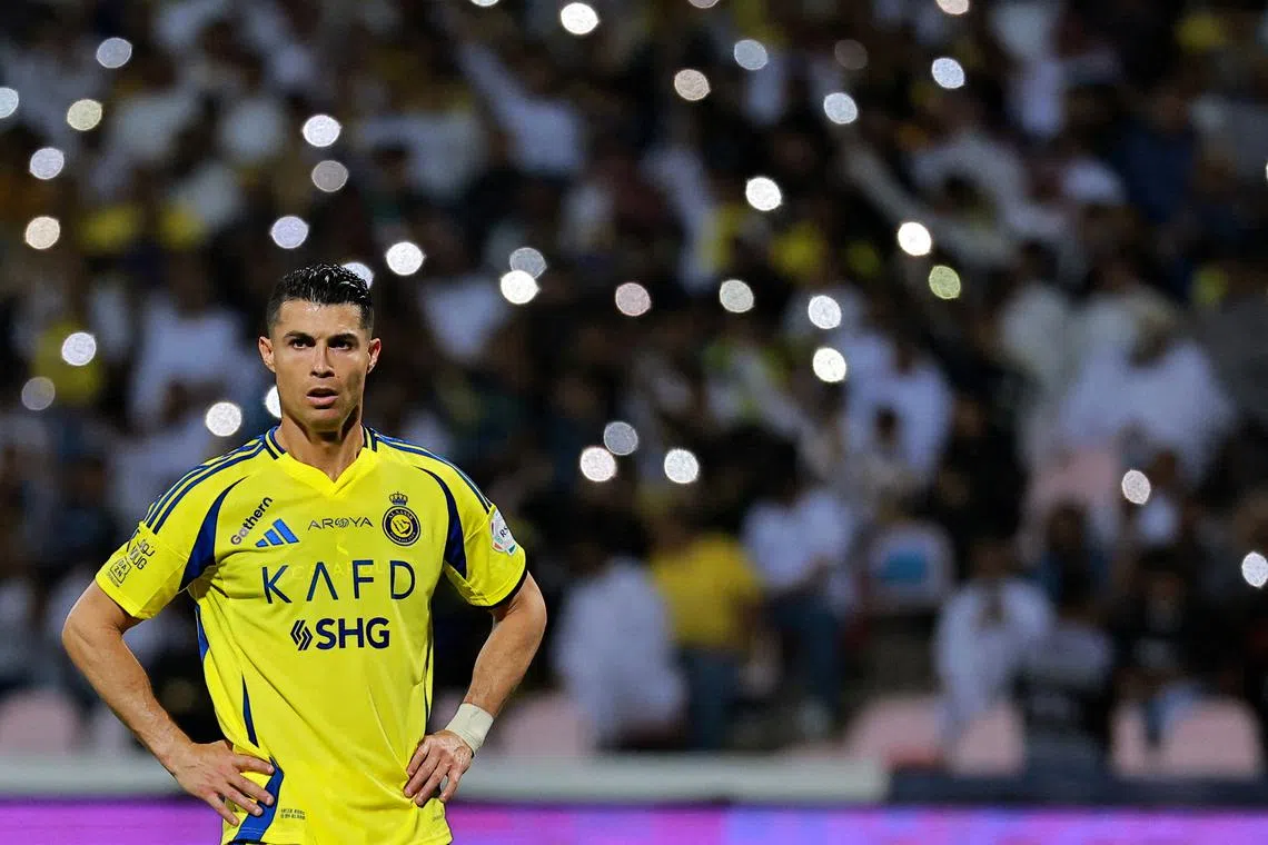 FILE PHOTO: Soccer Football - Saudi Pro League - Al Wehda v Al Nassr - King Abdul Aziz Stadium, Mecca, Saudi Arabia - February 25, 2025  Al Nassr's Cristiano Ronaldo reacts REUTERS/Stringer/File Photo