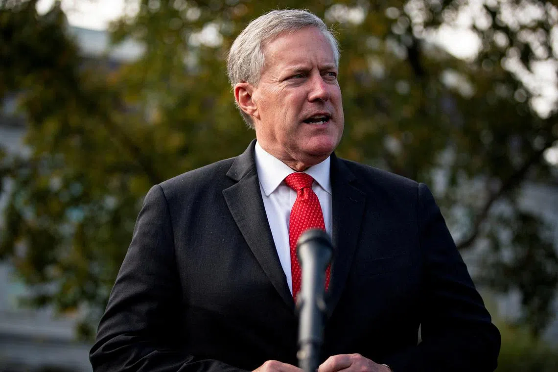 FILE PHOTO: White House Chief of Staff Mark Meadows speaks to reporters following a television interview, outside the White House in Washington, U.S. October 21, 2020. REUTERS/Al Drago/File Picture/File Photo