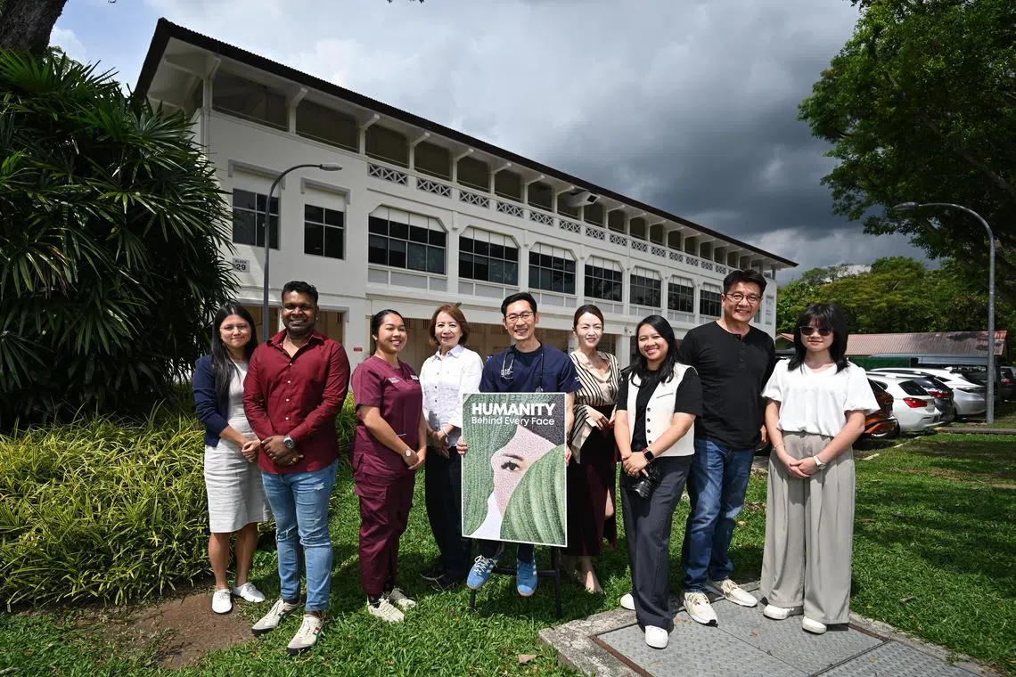 [EMBARGOED TILL 7 DEC, 2024 FOR ONLINE]
ST20241122-202454300672-Lim Yaohui-Chin Soo Fang-sfhumanity07/
(From left) Ms Ashley Nguyen, 39, Corporate Planning Manager, Alexandra Hospital; Mr Kesavan, 33, Associate Executive, ALPS Healthcare; Ms Aishah Elshukrin, 27, Senior Social Work Coordinator, Alexandra Hospital; Ms Serene Poh, 65, Senior Project Specialist, Office of Campus Planning, Alexandra Hospital; Associate Professor Khoo See Meng, 55, Chairman, Medical Board, Alexandra Hospital; Ms Yvonne Lee, 38, Writer of Humanity and Communications Manager, Alexandra Hospital; Ms Sheereen Yeo, 34, Photographer of Humanity and Senior Assistant Communications Manager, Alexandra Hospital; Mr Joe Khoo, 55, Art Director of Humanity and Senior Communications Manager, Alexandra Hospital; Ms Chloe Tan, 20, Writer of Humanity and Communications Intern, Alexandra Hospital; in front of Alexandra Hospital on Nov 22, 2024.
Alexandra Hospital (AH) is launching a book on 3 Dec 2024 - “Humanity: Behind Every Face”. These are 50 back stories of AH staff on their personal lives, struggles, hope, courage etc. Part of the proceeds go to AH’s Patient Welfare Fund.
(ST PHOTO: LIM YAOHUI)