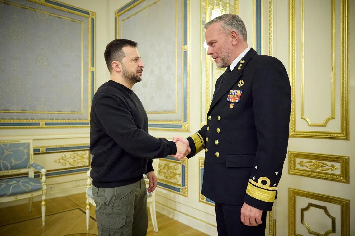 FILE PHOTO: Ukraine's President Volodymyr Zelenskiy meets with Chairman of NATO's military committee, Admiral Rob Bauer, amid Russia's attack on Ukraine, in Kyiv, Ukraine March 21, 2024. Ukrainian Presidential Press Service/Handout via REUTERS/File Photo