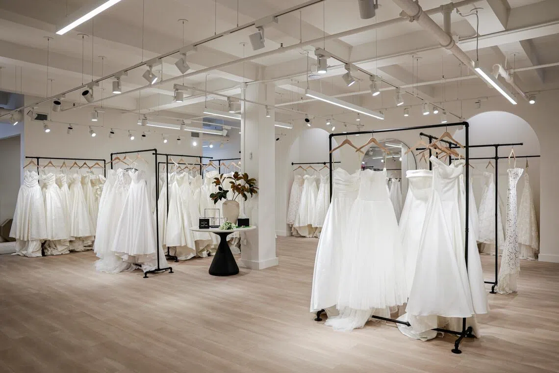 Wedding dresses are displayed at the Jenny Yoo bridal boutique in New York City, U.S., August 6, 2026. REUTERS/Jeenah Moon