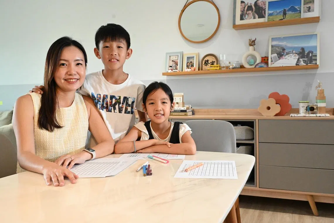 Ms Jacinth Liew with her son Daryl Chua, 10, and daughter Charlotte Chua, eight.