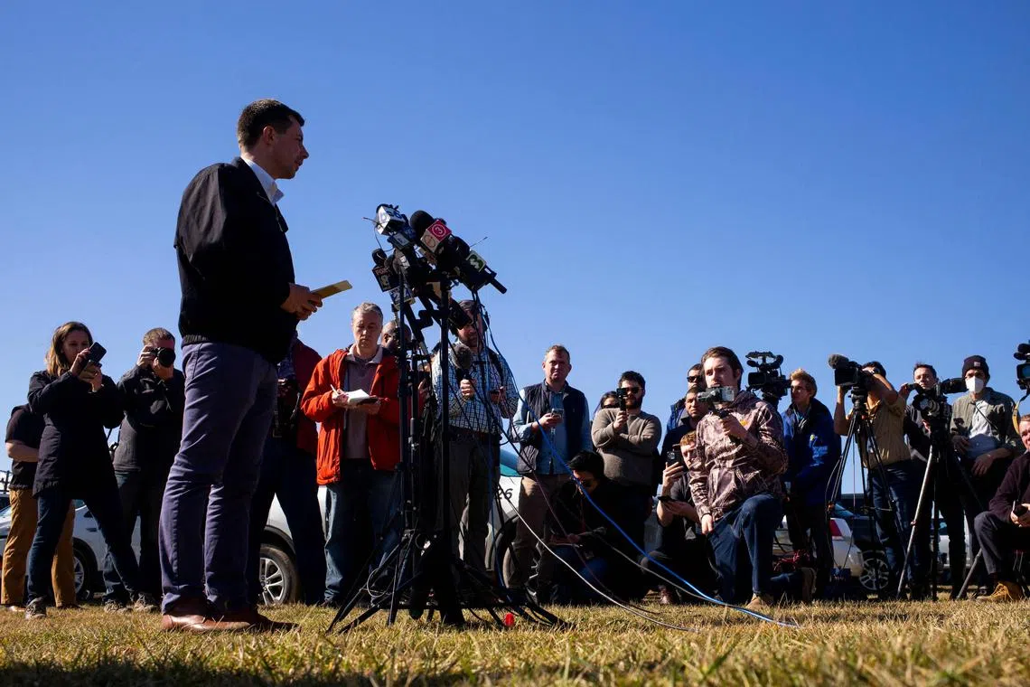 US Transportation Secretary Pete Buttigieg delivers remarks to the press as he visited the site of the Norfolk Southern train derailment, on Feb 23, 2023.