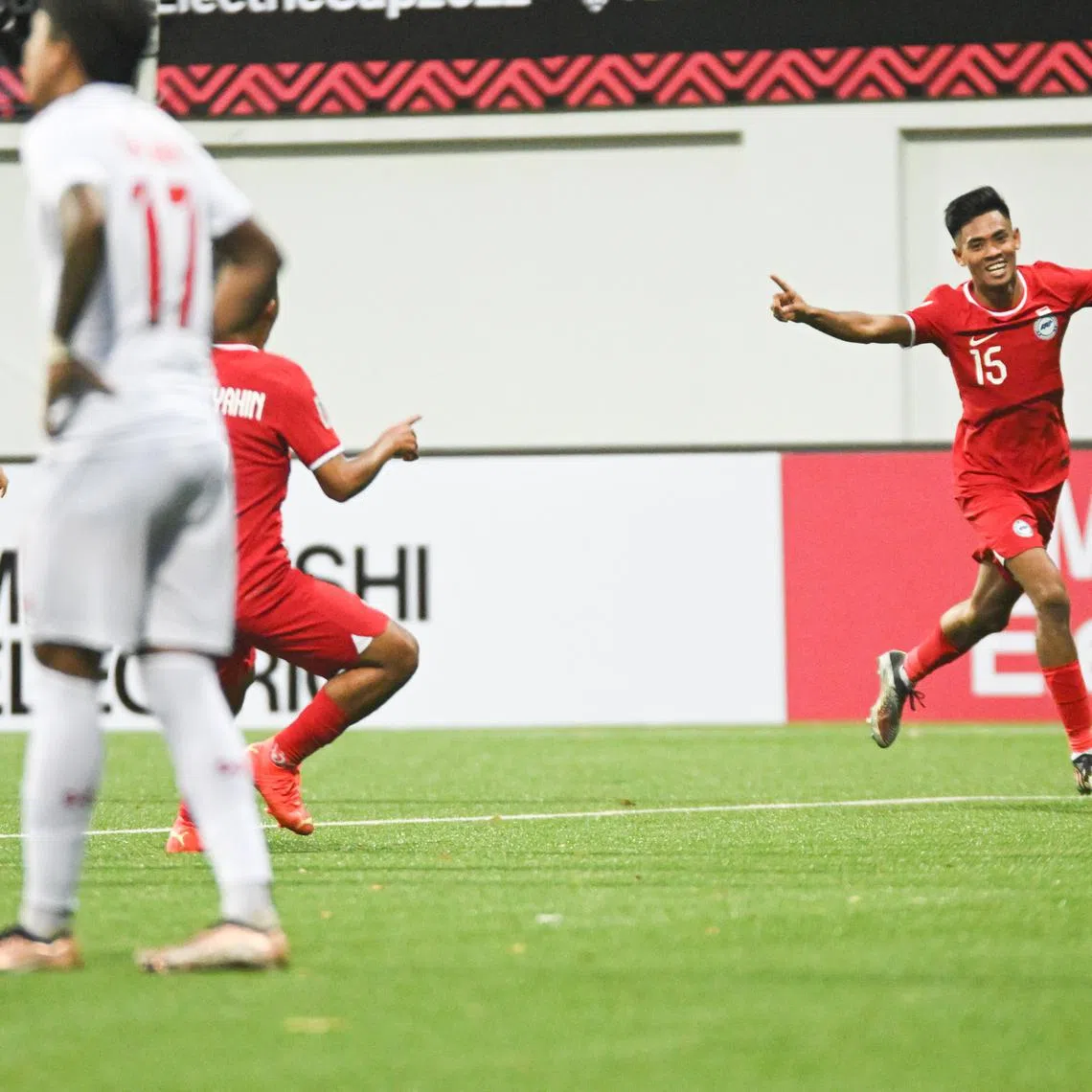 Singapore midfielder Shah Shahiran celebrating after scoring the Lions' second goal against Myanmar in the AFF Championship at Jalan Besar on Saturday. 