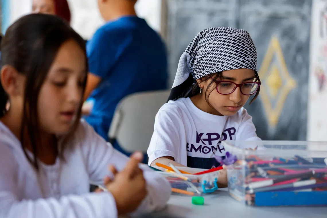 In West Bank art centre, Palestinian children paint hopes beyond checkpoints