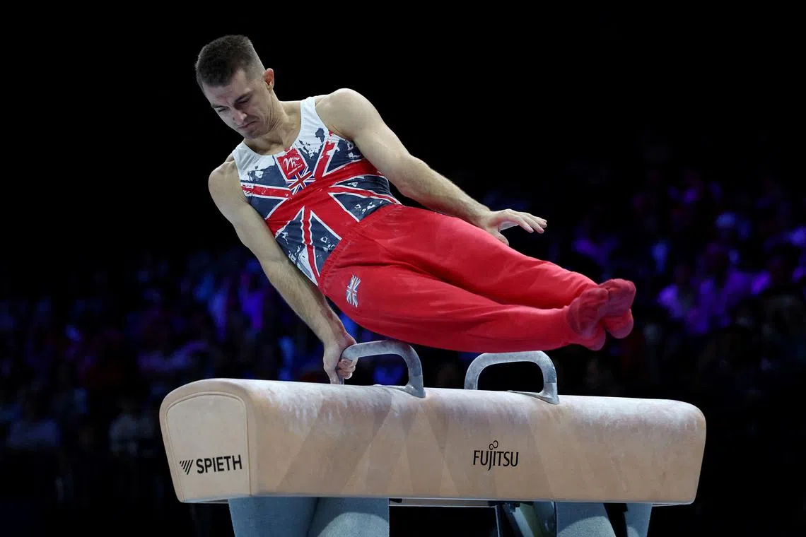 FILE PHOTO: Gymnastics - 2023 World Artistic Gymnastics Championships - Sportpaleis, Antwerp, Belgium - September 30, 2023 Britain's Max Whitlock in action on the pommel horse during the men's qualification REUTERS/Yves Herman/File Photo