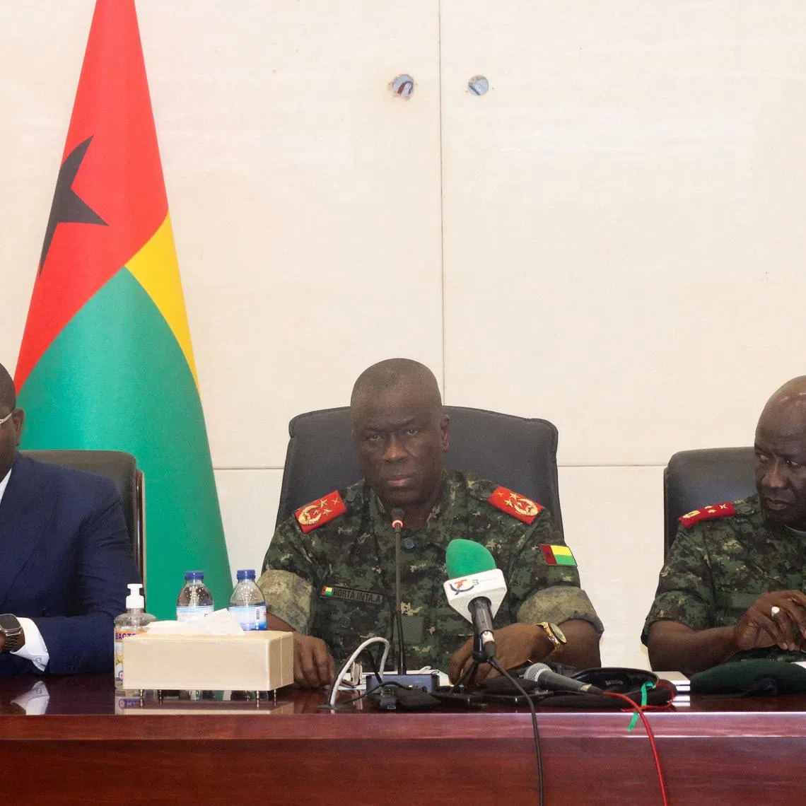 FILE PHOTO: From L-R, Guinea-Bissau's Prime Minister Ilidio Vieira Te, transitional president Major-General Horta Inta-a and Major-General Tomas Djassi, chief of staff of the Armed Forces, attend a press conference in Bissau, Guinea-Bissau, December 19, 2025.  REUTERS/Delcyo Sanca/File Photo