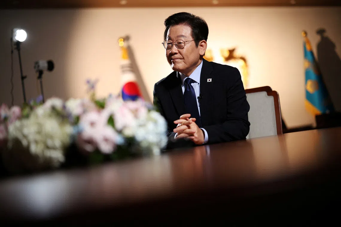 South Korean President Lee Jae Myung pauses while answering a reporter's question during an interview with Reuters at the Presidential Office in Seoul, South Korea, September 19, 2025.   REUTERS/Kim Hong-Ji