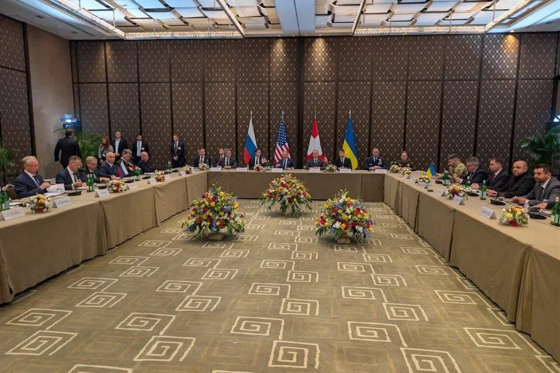 At the Feb 17 talks are (from left) the Russian, American and Ukrainian delegations.