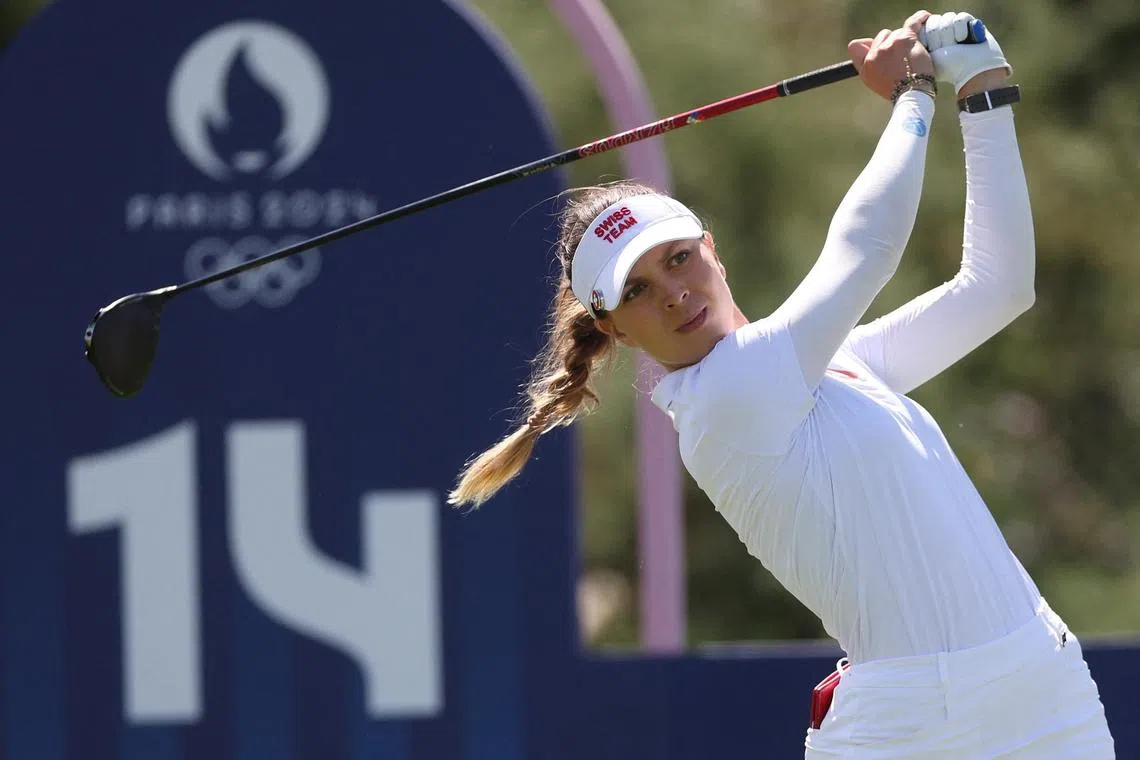 Paris 2024 Olympics - Golf - Women's Round 2 - Le Golf National, Guyancourt, France - August 08, 2024.
Morgane Metraux of Switzerland hits her tee shot on the 14th hole during the second round REUTERS/Paul Childs