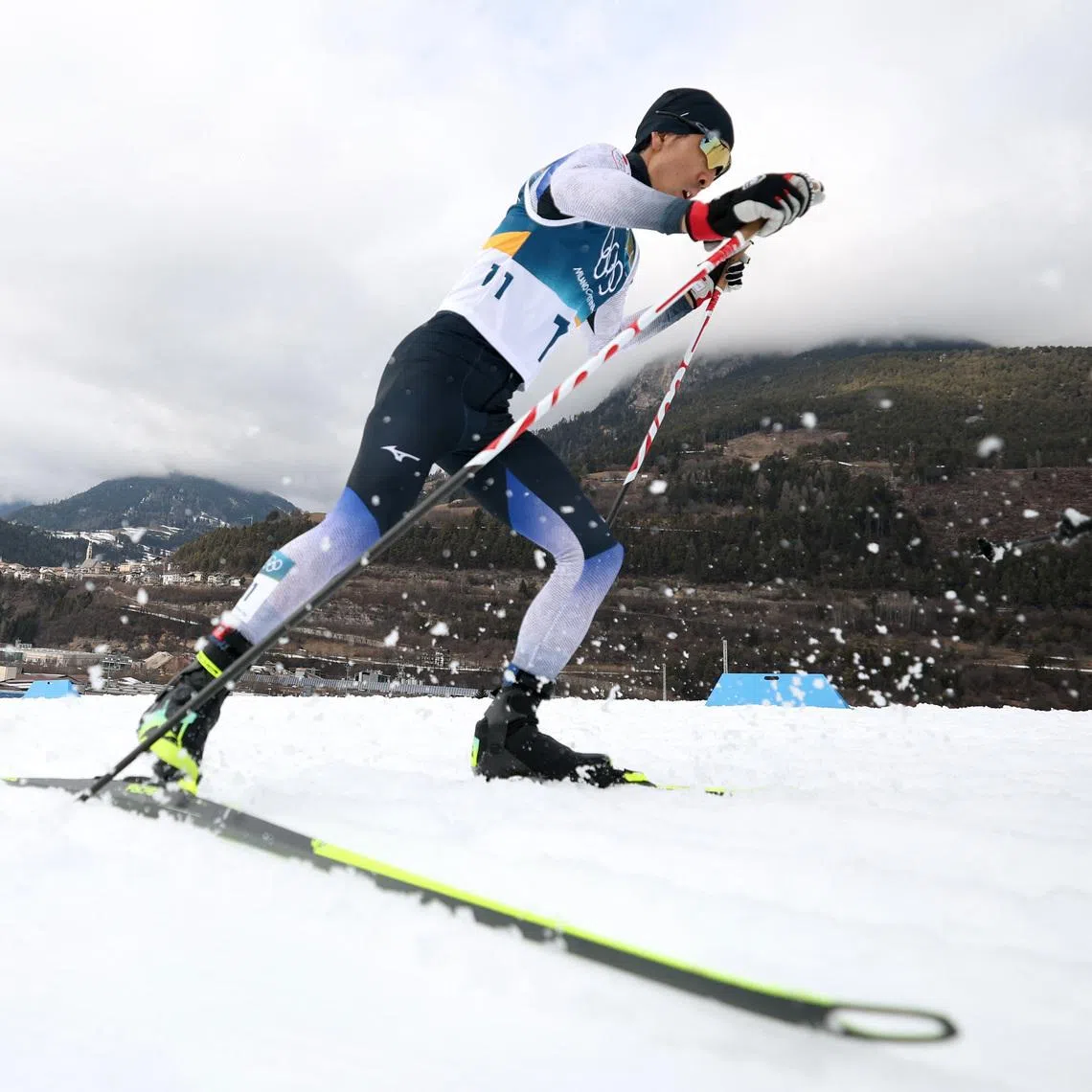 Milano Cortina 2026 Olympics - Nordic Combined - Individual Gundersen Normal Hill/10km, Cross-Country - Tesero Cross-Country Skiing Stadium, Lago, Italy - February 11, 2026. Akito Watabe of Japan in action during the cross-country race. REUTERS/Kacper Pempel