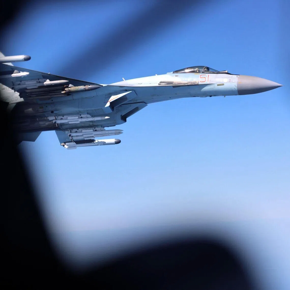 A Russian Su-35 is seen alongside a British Rivet Joint aircraft over the Black Sea in April 2026.
