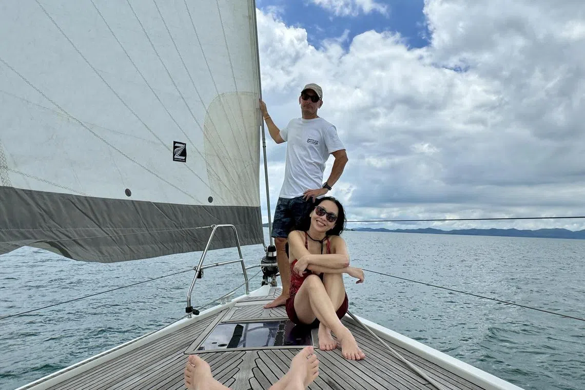 Singaporean jeweller Maddy Barber and her husband Wez Barber on their sailboat in Phuket. 
