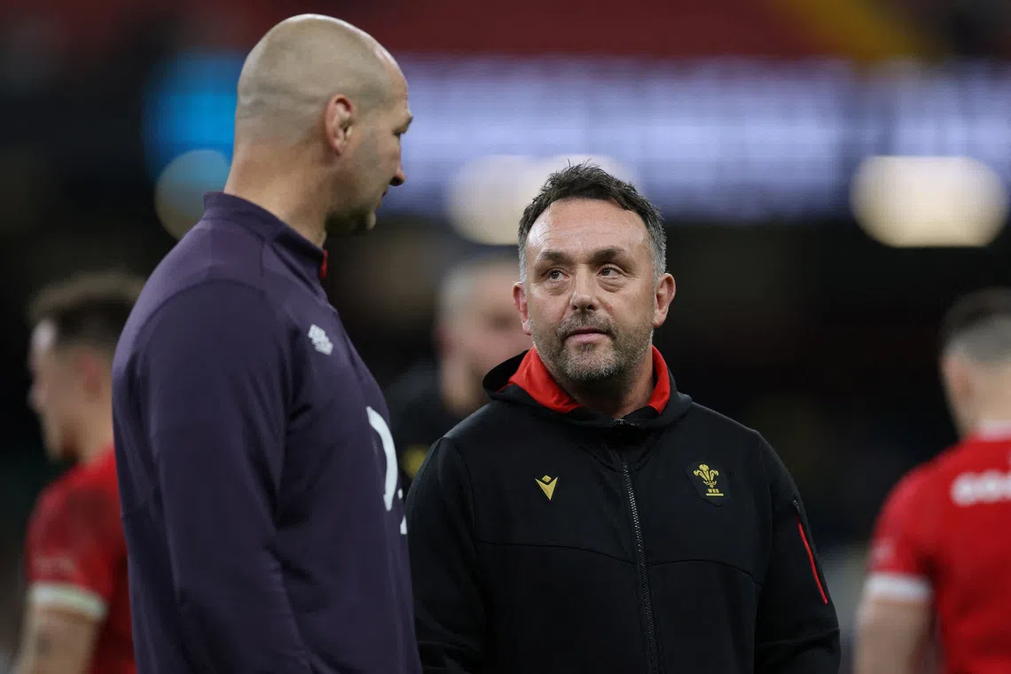 FILE PHOTO: Rugby Union - Six Nations Championship - Wales v England - Millennium Stadium, Cardiff, Wales, Britain - March 15, 2025  Wales interim head coach Matt Sherratt (right) and England head coach Steve Borthwick talk at the end of the match Action Images via Reuters/Paul Childs/File Photo