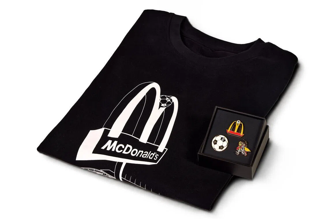 The members’ exclusive McDonald’s Football Kit, which includes a T-shirt and collectible pin set.