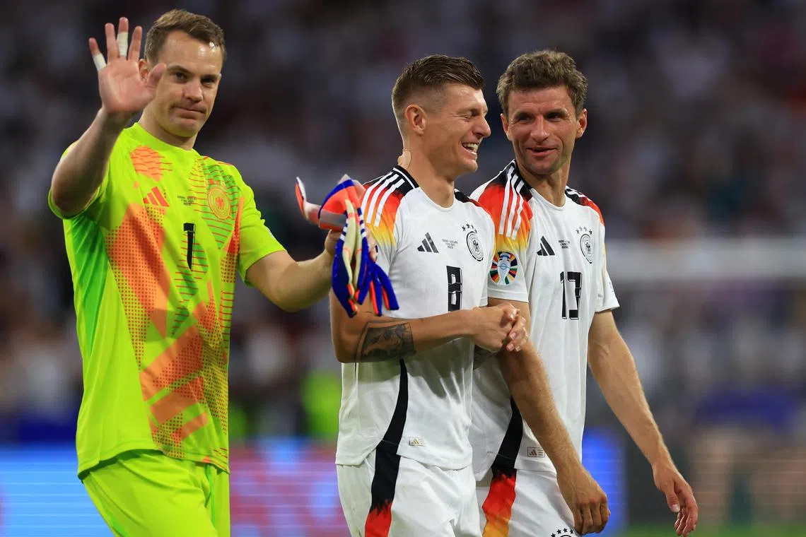From left: Goalkeeper Manuel Neuer, Toni Kroos  and Thomas Muller of Germany celebrate after the 5-1 win over Scotland in their Euro 2024 opener.