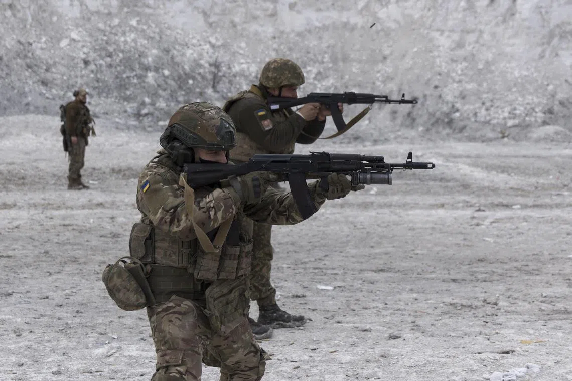 Ukrainian servicemen train at a shooting range in Ukraine's Donetsk region, amid Russia's invasion of Ukraine.