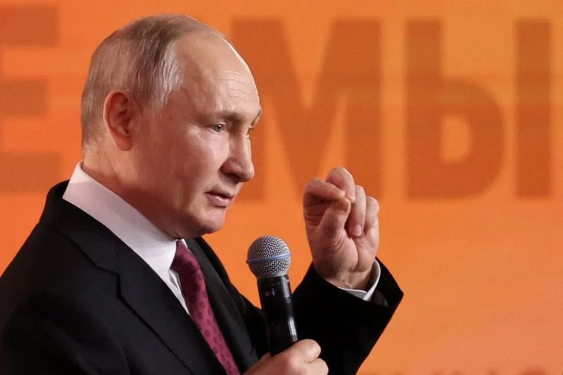 Russian President Vladimir Putin delivers a speech during a ceremony awarding the prize winners of a civic engagement forum in Moscow, Russia, December 4, 2023. Sputnik/Mikhail Klimentyev/Pool via REUTERS