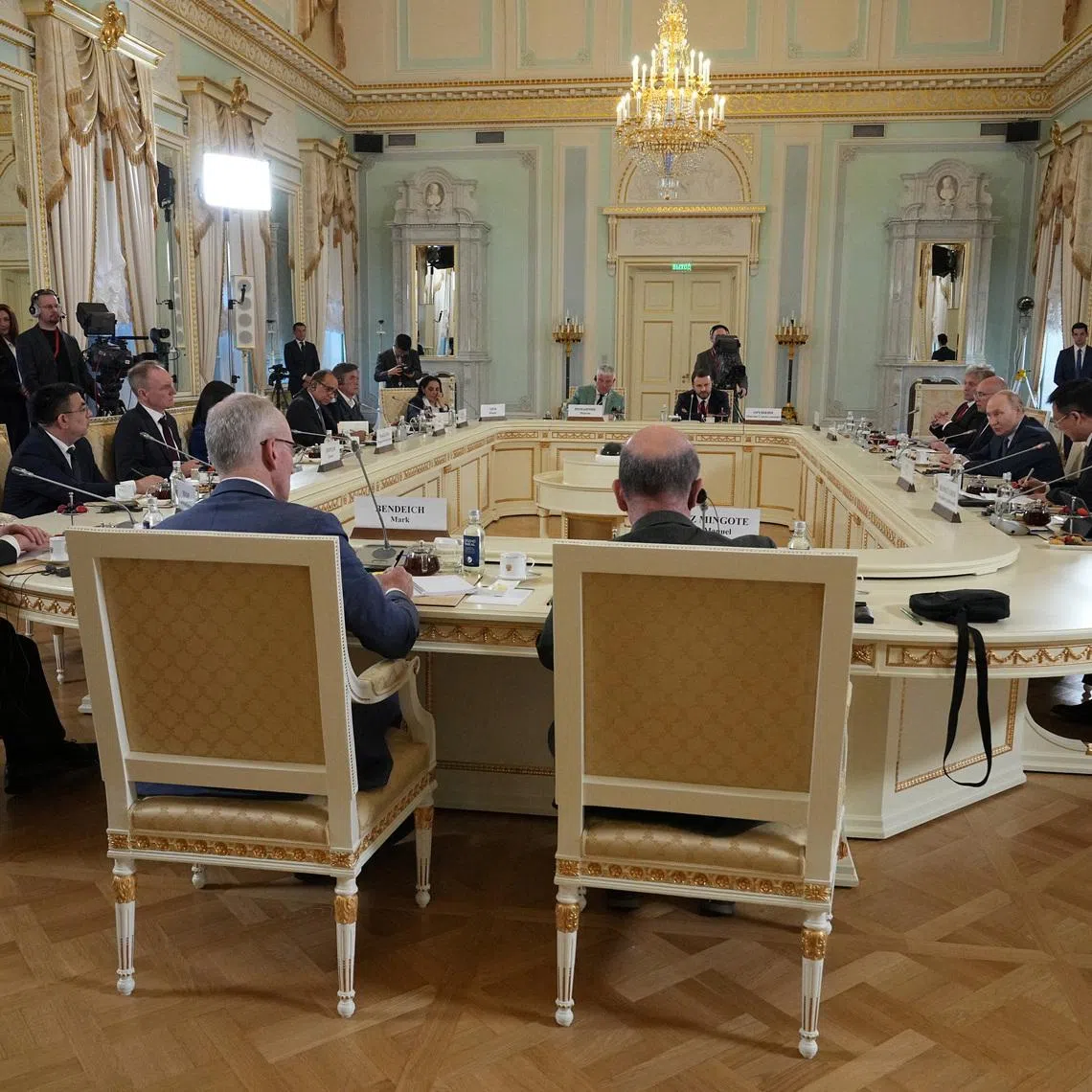 Russian President Vladimir Putin meets with representatives of international news agencies on the sidelines of the St. Petersburg International Economic Forum, at the Constantine Palace in St. Petersburg, Russia, June 4, 2026.  Dmitri Lovetsky/Pool via REUTERS