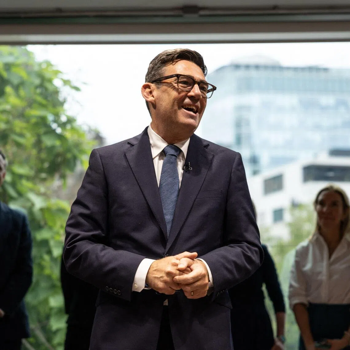 Britain’s Prime Minister Andy Burnham speaks during a visit to officially open No. 10 North in Manchester, north-west England, on July 24.