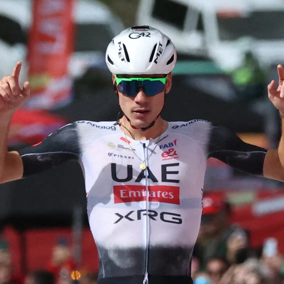 FILE PHOTO: Cycling - Vuelta a Espana - Stage 7 - Andorra la Vella to Cerler - Andorra la Vella, Andorra - August 29, 2025 UAE Team Emirates XRG's Juan Ayuso crosses the finish line to win stage 7 REUTERS/Bruna Casas/File Photo