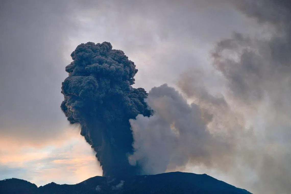 Mount Marapi volcano spews volcanic ash during an eruption as seen from Nagari Bukik Batabuah in Agam, West Sumatra province, Indonesia, January 14, 2024, in this photo taken by Antara Foto. Antara Foto/Iggoy el Fitra/ via REUTERS