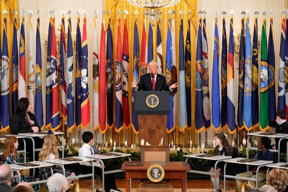 US President Donald Trump speaks during an event to sign an executive order to shut down the Department of Education, in the East Room at the White House in Washington, D.C., on March 20. 