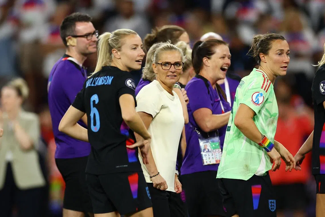 England manager Sarina Wiegman (centre) celebrating with her players after their Euro 2025 semi-final match win against Italy on July 22.
