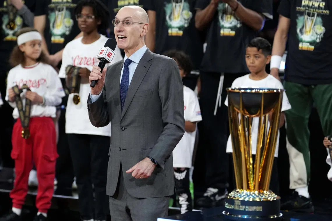 FILE PHOTO: Dec 17, 2024; Las Vegas, Nevada, USA; NBA commissioner Adam Silver presents the trophy to the Milwaukee Bucks after they won the Emirates NBA Cup championship game against the Oklahoma City Thunder at T-Mobile Arena. Mandatory Credit: Kyle Terada-Imagn Images/File Photo