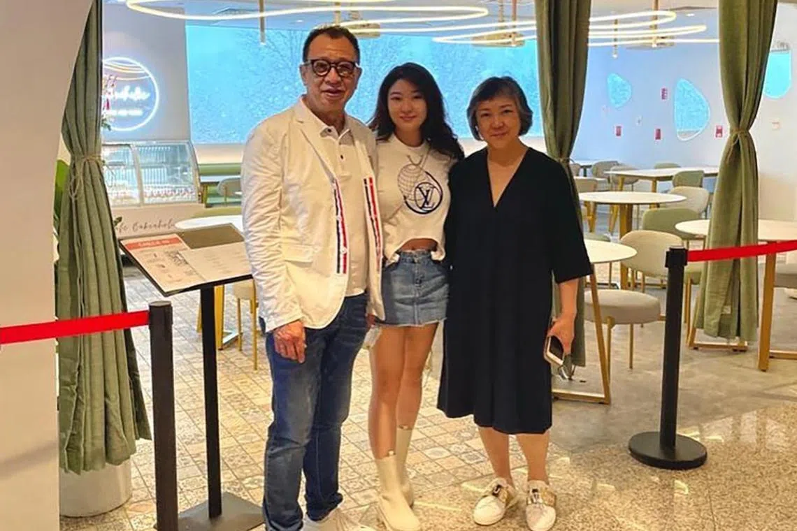 Benz Hui with his wife Angeli Lung and their daughter Charmaine Hui at Cafe Bakeaholic at Wheelock Place, in a photo posted on social media in January 2022.