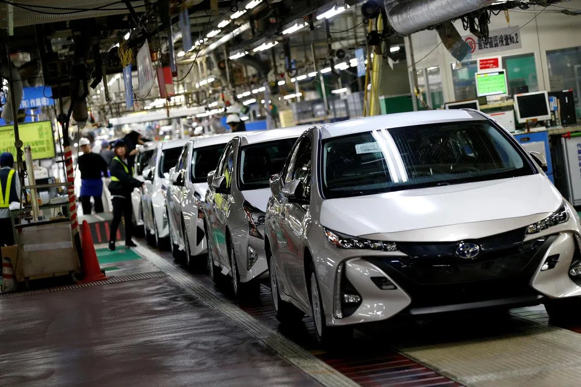 Toyota Prius hybrid cars on an assembly line at Toyota's Tsutsumi plant in central Japan.