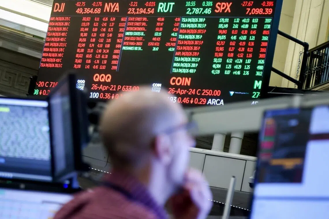 Traders working on the floor of the American Stock Exchange at the New York Stock Exchange (NYSE) in New York on  April 20, 2026. 