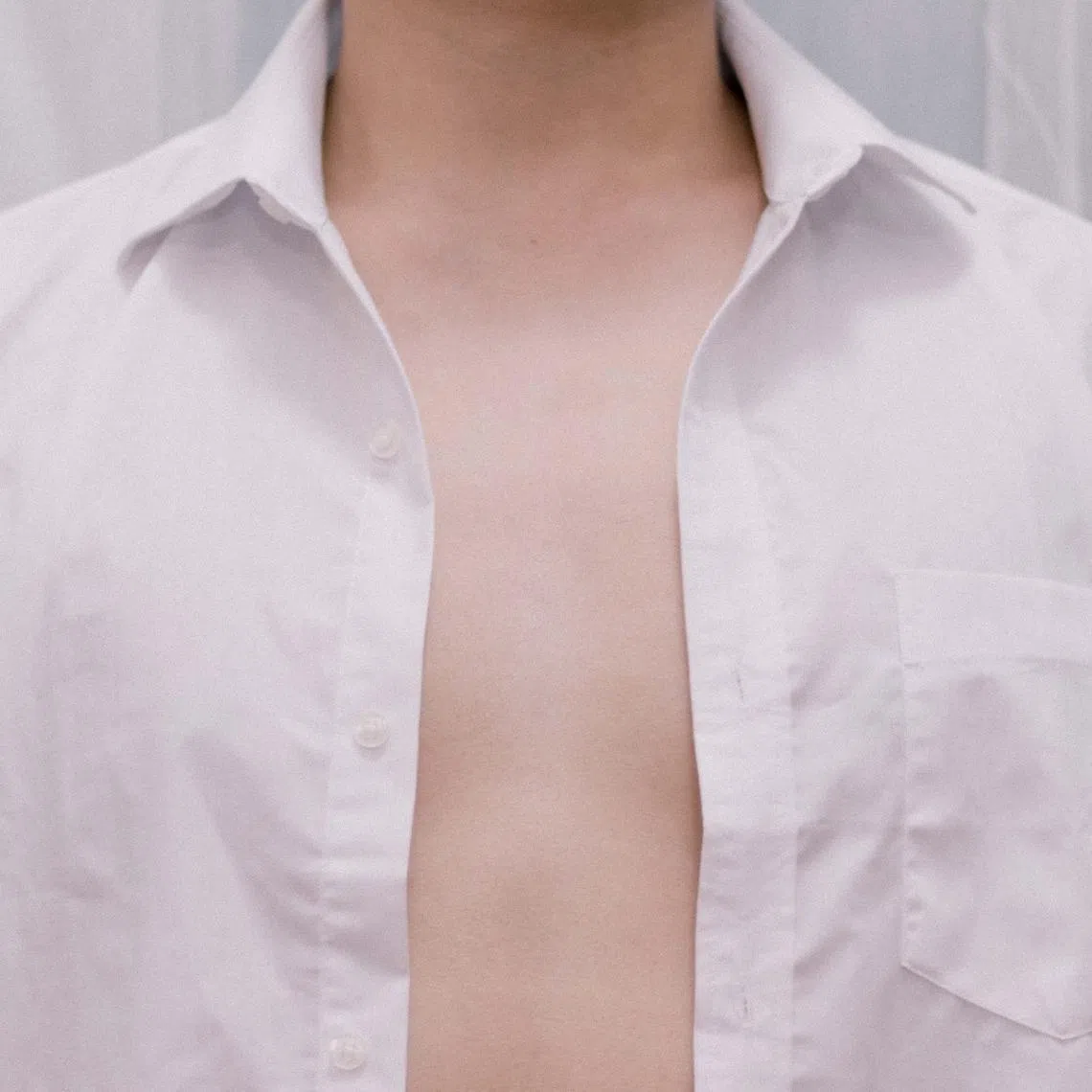 Men with gynecomastia may feel self-conscious because of their enlarged breasts.