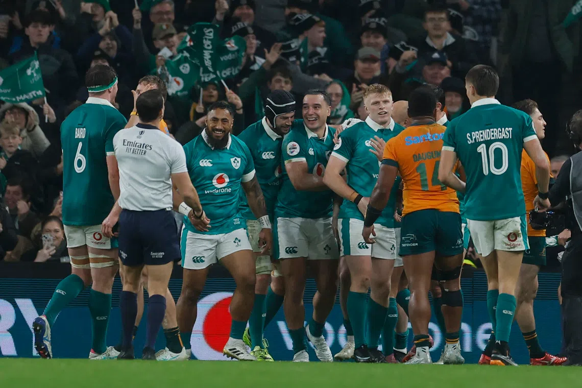 Rugby Union - Autumn Internationals - Ireland v Australia - Aviva Stadium, Dublin, Ireland - November 15, 2025 Ireland's Mack Hansen celebrates scoring their third try with teammates REUTERS/Clodagh Kilcoyne