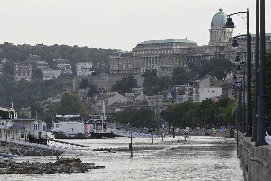 The flooded lower embankments of the Danube river with the Royal Palace in the background in Budapest, Hungary, on Sept 18. The Danube is expected to rise to its highest levels in 10 years. 