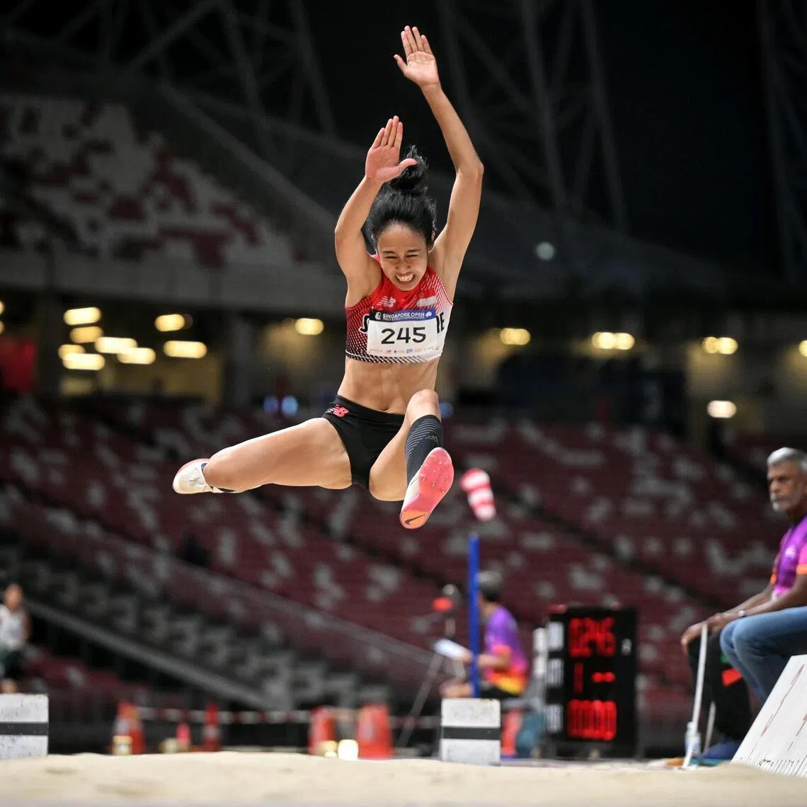 Singapore's Tia Rozario leaping her way to a silver medal at the Singapore Open Track & Field Championships on April 16, 2026.