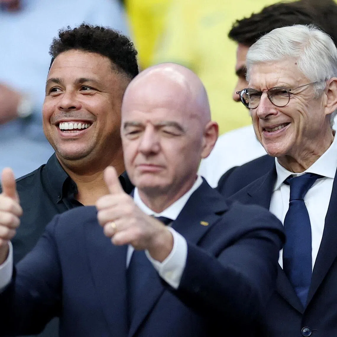 (From left) Former Brazil striker Ronaldo, FIFA president Gianni Infantino and FIFA chief of global football development Arsene Wenger during the World Cup match between Scotland and Brazil on June 24.