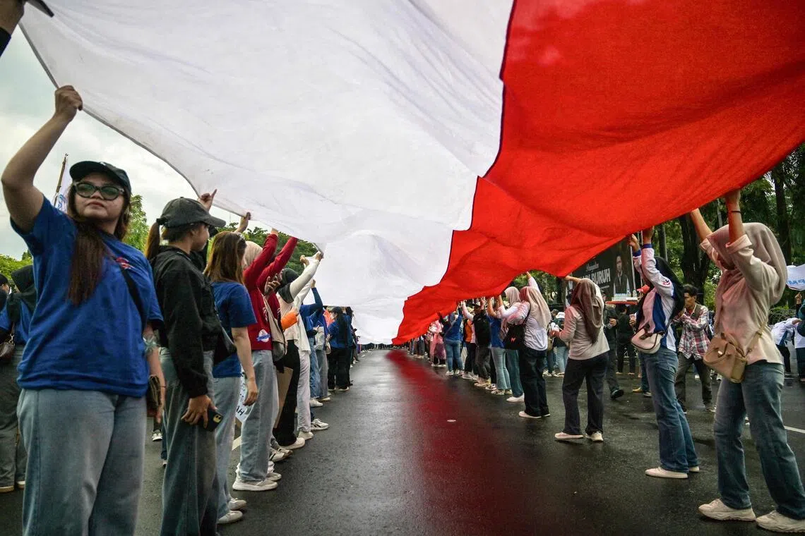 Indonesia’s top court rules to bar parties that breach 30% gender quota from legislative polls