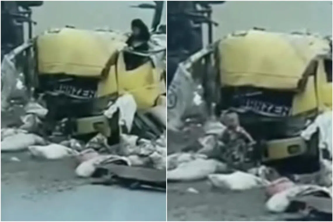 The baby, one-year-old Fatih Akbar, was seen crawling out from a badly damaged truck and toddling towards his mother.