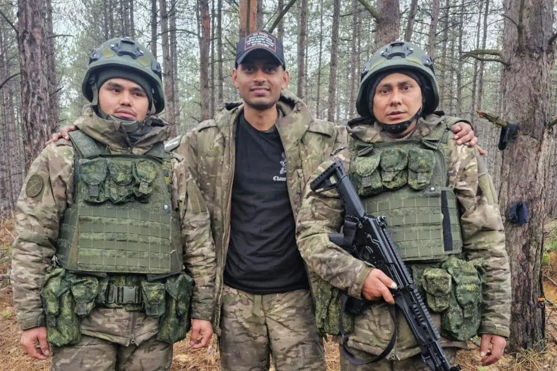 Indian Hemil Mangukiya (centre), who was reportedly lured to the frontline under false pretences, died in a missile strike in Russia, his family said.